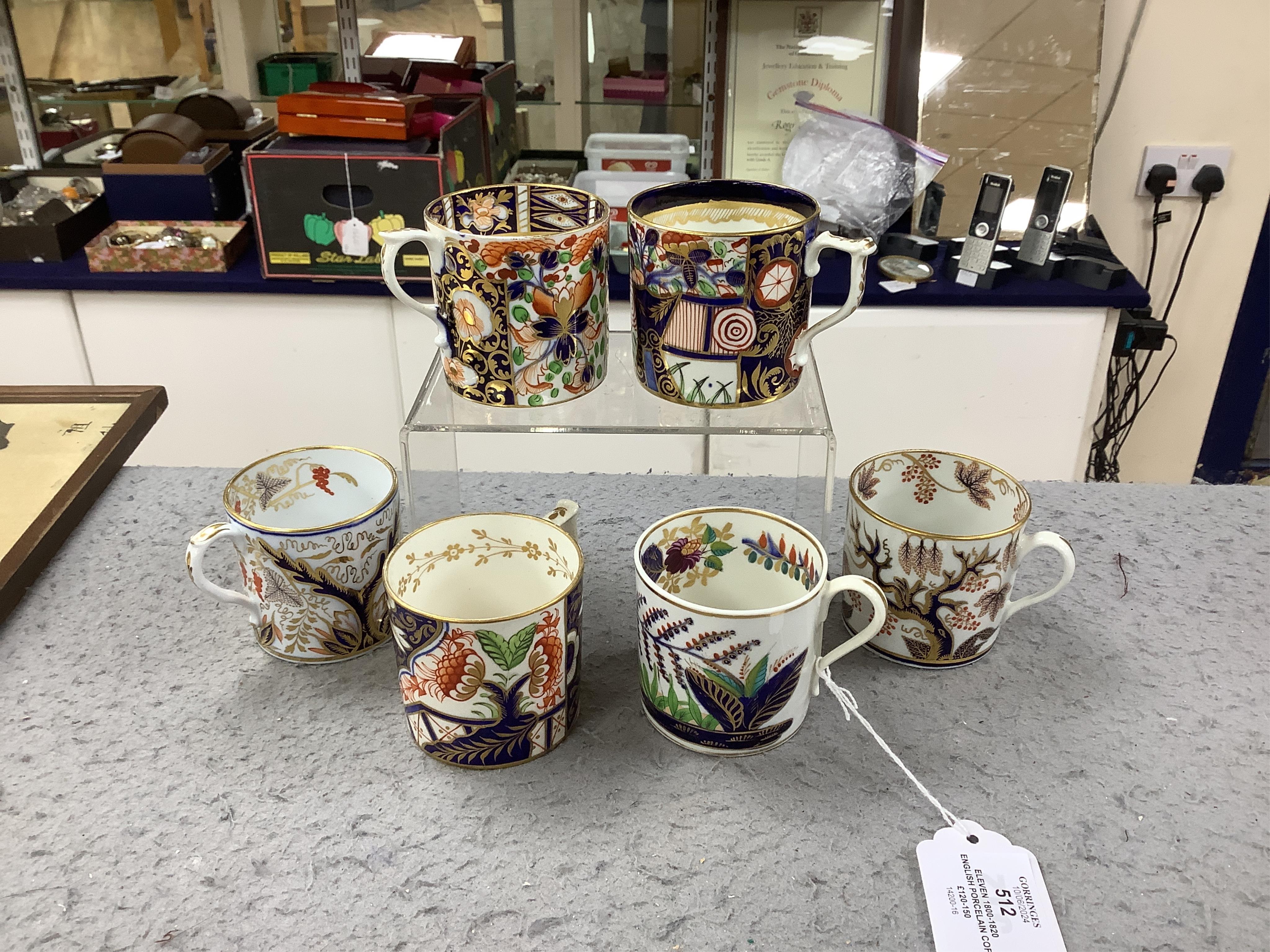 Eleven 1800-1820 English porcelain coffee cans and tea cups, including Imari pattern examples, one with matching saucer